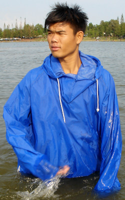 wet green anorak under shower