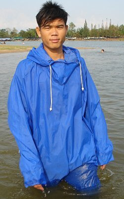 wet purple anorak in lake