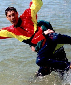 play cagoule swimming in clothes