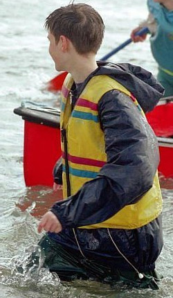 Girls capsize a canoe
