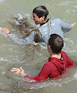 Swimming in a sweatshirt