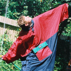 poncho blue red garden hose pipe