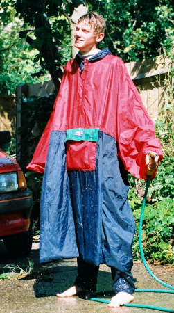 poncho blue red garden hose pipe