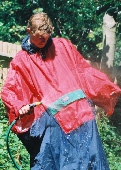 poncho blue red garden hose pipe