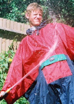 poncho blue red garden hose pipe