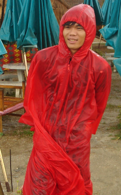 red poncho lake rain hiking cape walk