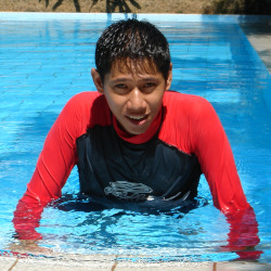 wet swim shirt in pool