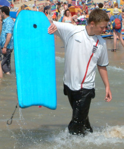 Swimming in a  surf shirt